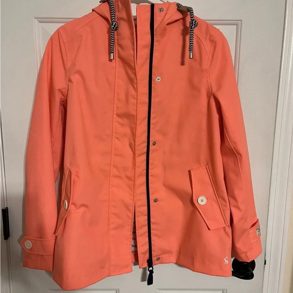 Joules USA Rain Jacket
Color: Neon Pink
Size: 4
